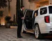 Hourly chauffeur service NYC driver waiting outside a client stop