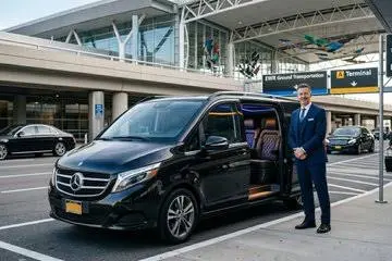 NYC airport transportation driver watching real-time flight status